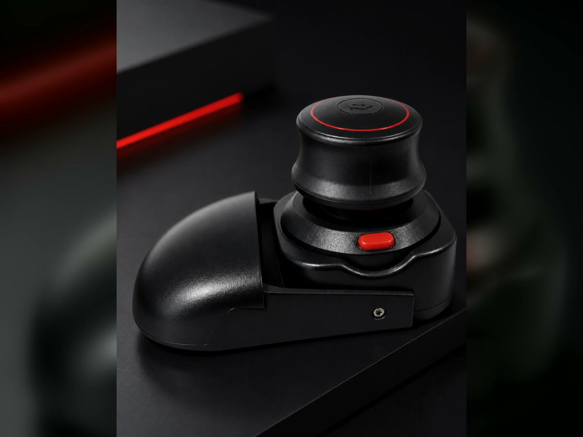 Wireless 3D CAD Mouse in a dark technical studio setup